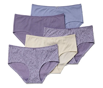 Six culottes pour femmes de différentes couleurs et motifs sont disposées en pile.