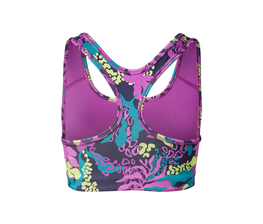 Gros plan d'une brassière de sport avec une doublure violette et un motif de corail bleu, violet et vert.