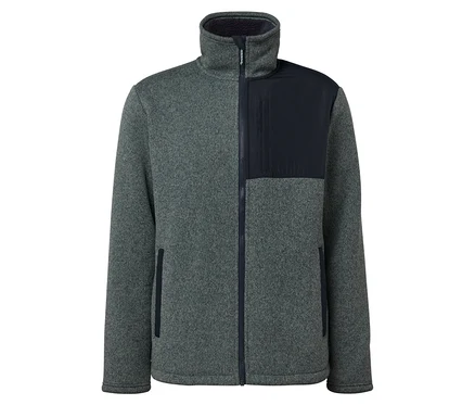 Veste en polaire grise avec détails bleu foncé sur la poche poitrine et la fermeture éclair.