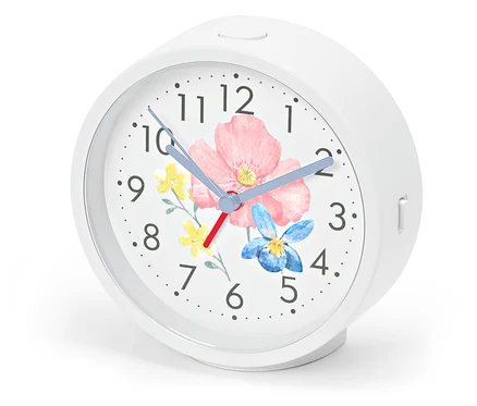 Réveil avec rétro-éclairage, cadran à motif floral.