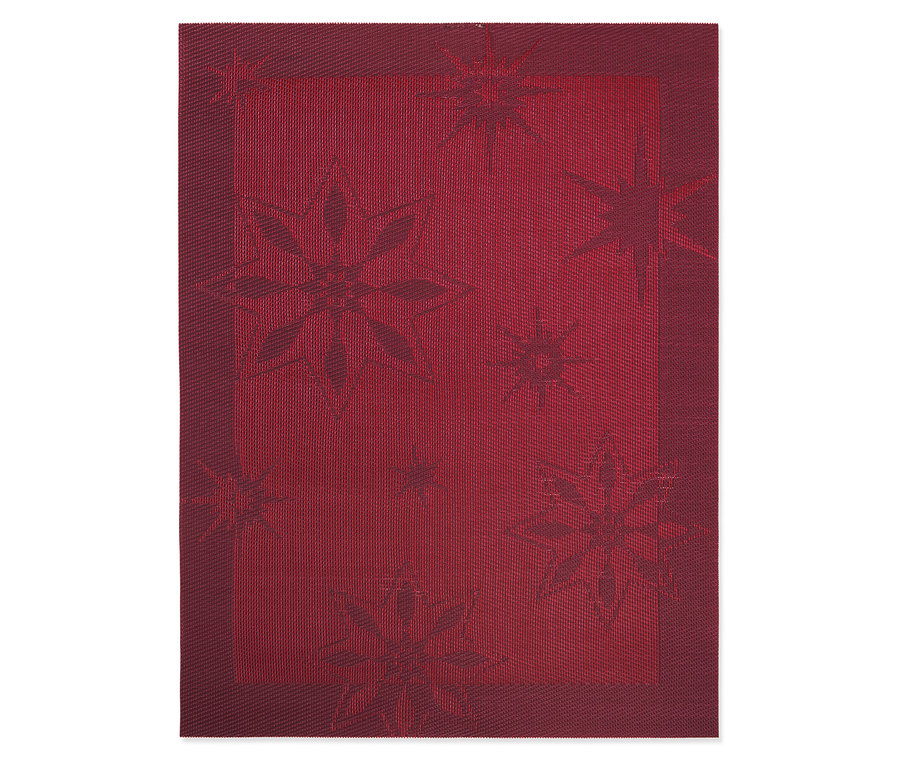 Un napperon rouge avec un motif d'étoile.
