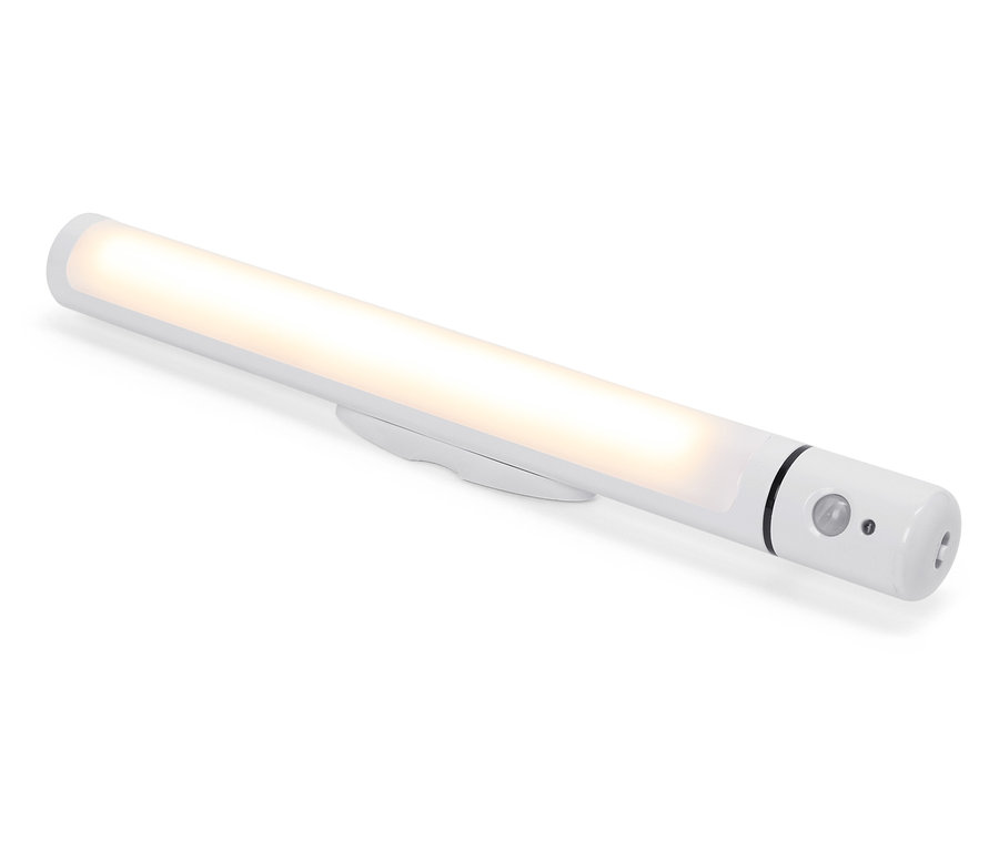 Une lumière LED blanche avec détecteur de mouvement est posée sur un fond blanc.