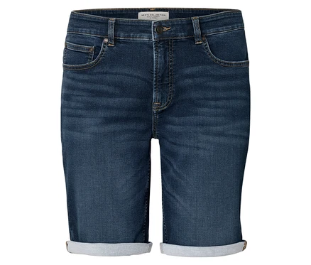 Gros plan d'un short en jean bleu foncé avec un ourlet retroussé.