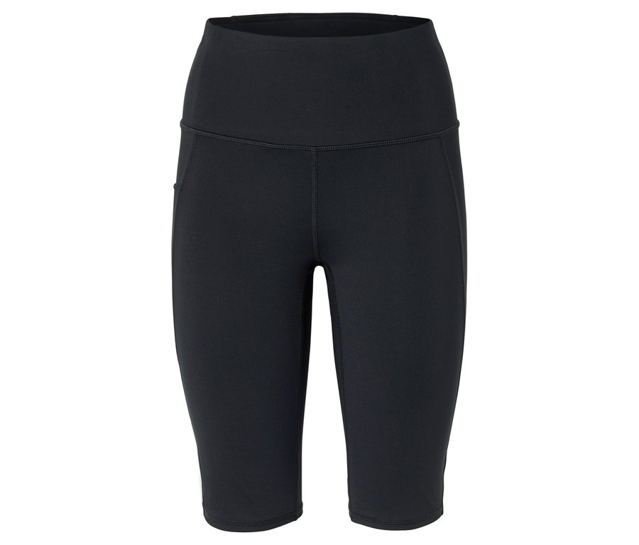 Gros plan d'un legging noir arrivant au genou sur fond blanc.