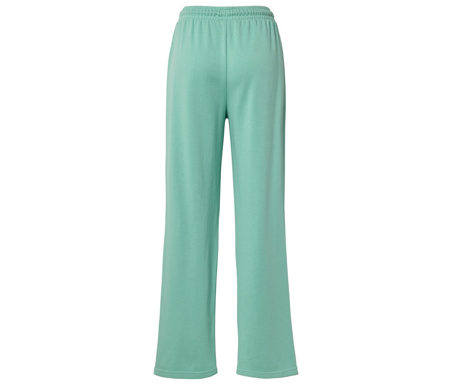 Vue arrière d'un pantalon ample vert clair avec une taille élastique.