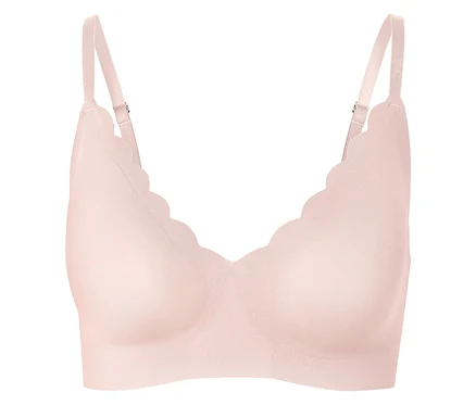 Soutien-gorge confort «bonded» rose avec bord festonné et fines bretelles.