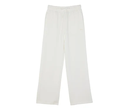 Pantalon de jogging blanc à jambes larges avec taille élastique à cordon de serrage, poches latérales et petit logo Fila sur la cuisse gauche.