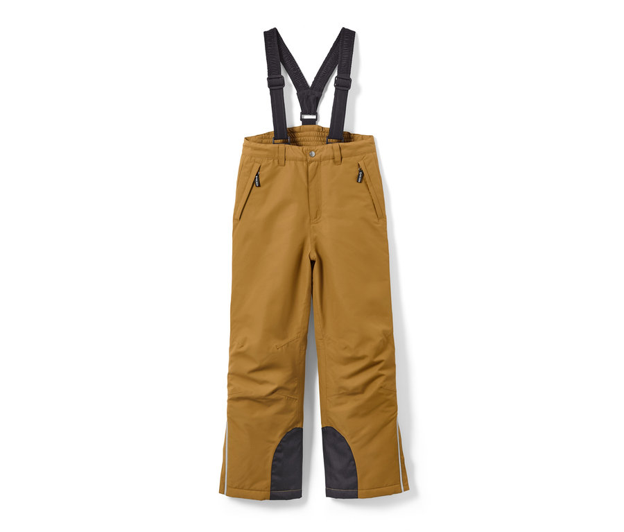 Un pantalon de ski pour enfant couleur camel avec des bretelles noires et des genoux renforcés.