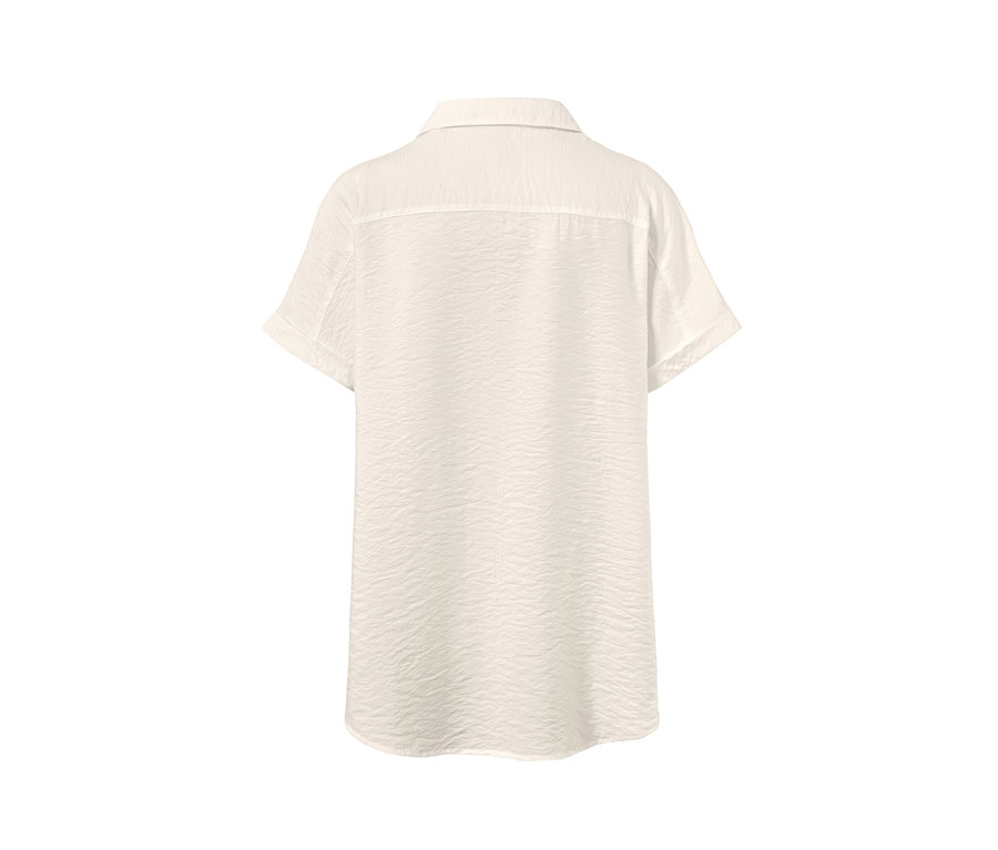 Vue arrière d'une blouse crème à manches courtes.
