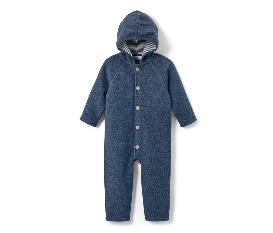 Combinaison pour bébé bleu avec laine mérinos, capuche et boutons.