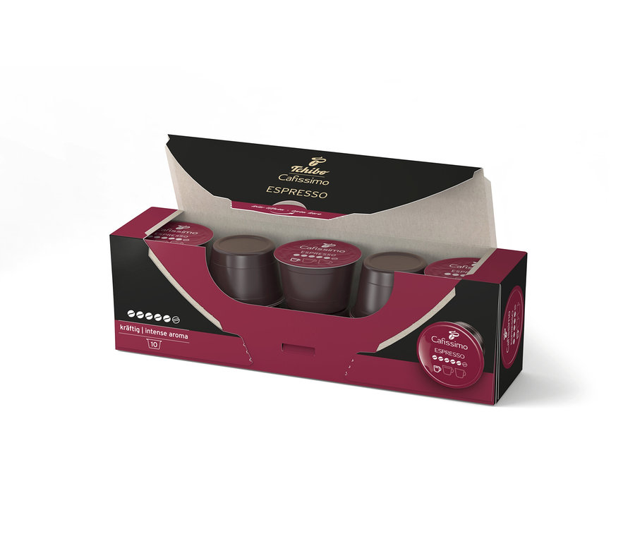 Paquet ouvert de capsules Cafissimo Espresso. Plusieurs capsules sont visibles dans le paquet.