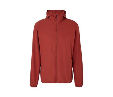 Veste fonctionnelle Packpare rouge avec fermeture éclair et capuche.