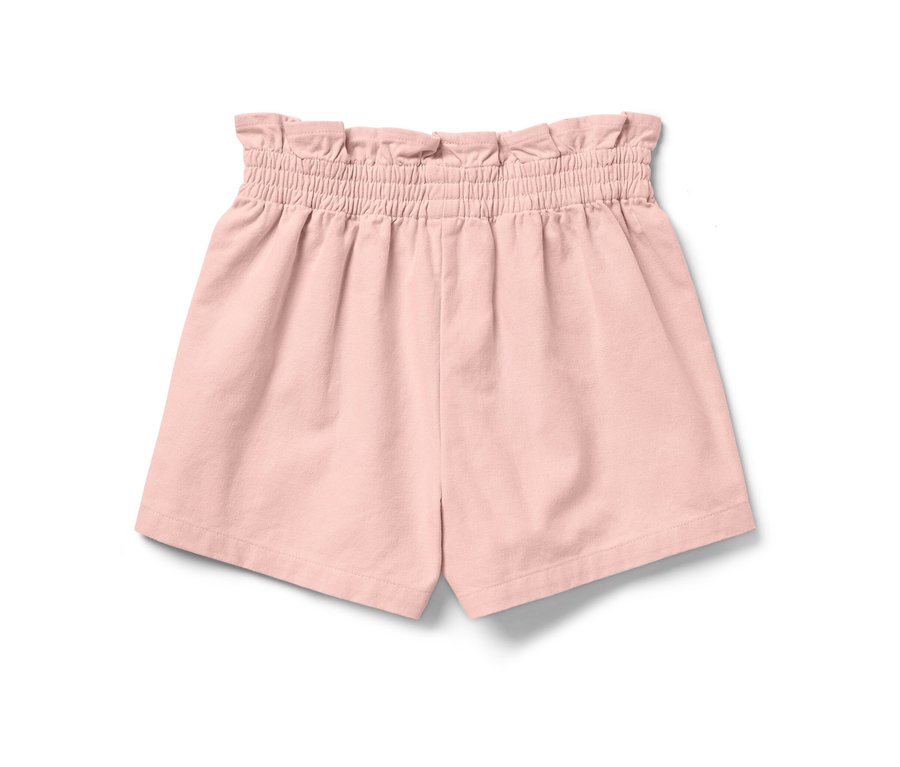 Short paper bag rose pour enfant sur fond blanc.