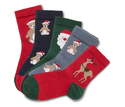 Cinq paires de chaussettes de Noël avec des motifs d'ours, de Père Noël et de renne.