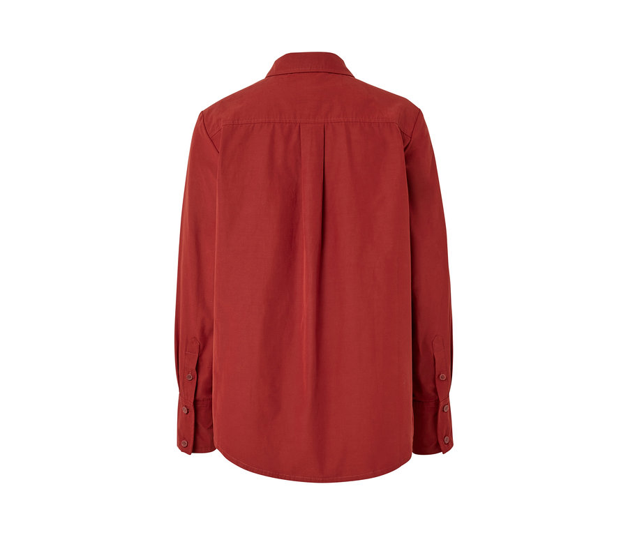 Vue arrière de la blouse d’extérieur avec protection anti-moustiques.