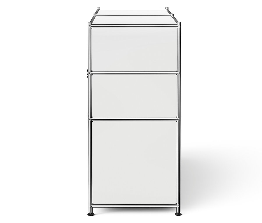 Élément de rangement blanc avec trois tiroirs et cadre chromé.