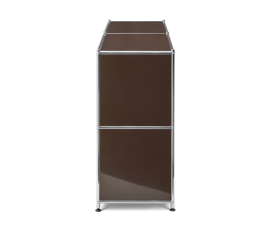 Meuble modulaire marron avec cadre chromé, composé de deux sections superposées avec des panneaux marron brillants et de petits pieds foncés.