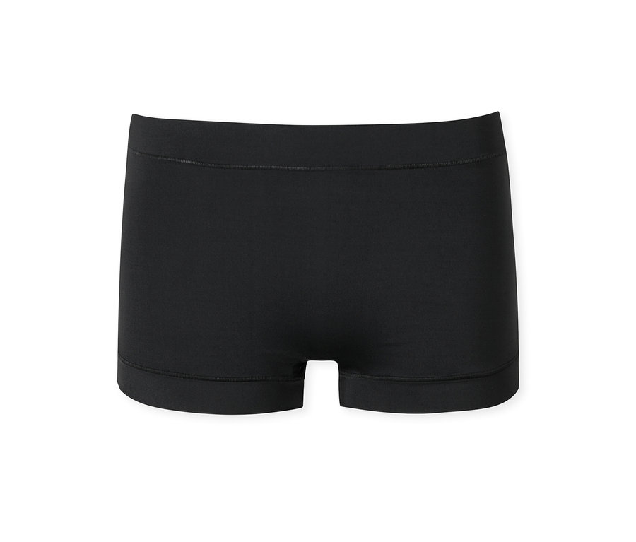 Un boxer noir sans couture, avec une large ceinture élastique et des jambes courtes, posé à plat sur un fond blanc.