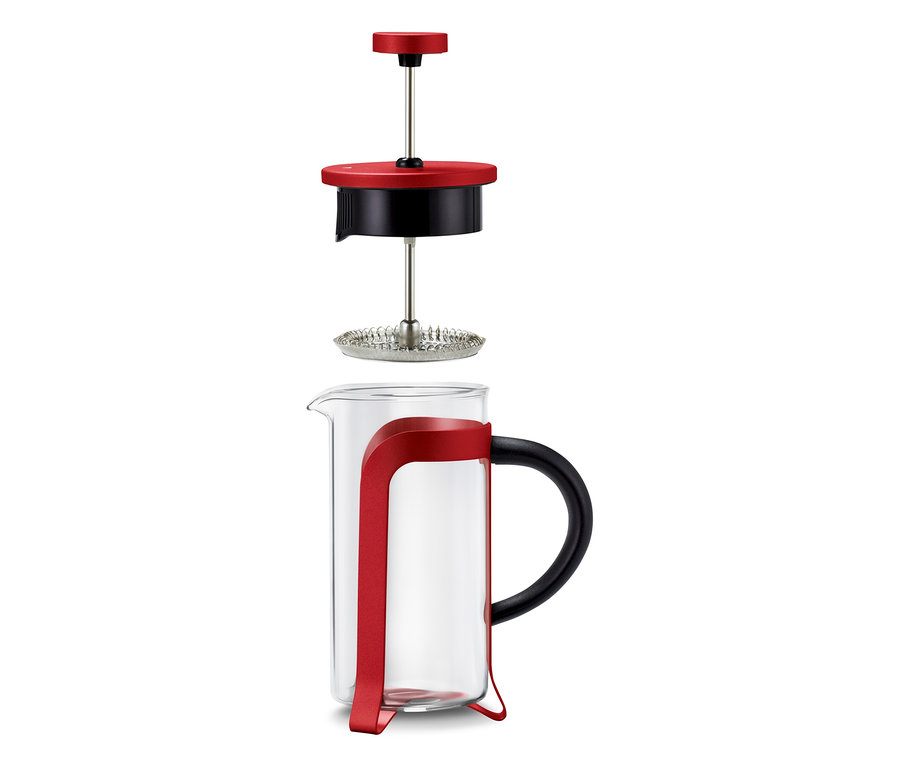Une cafetière à piston rouge de 300 ml pour 2 tasses, démontée.