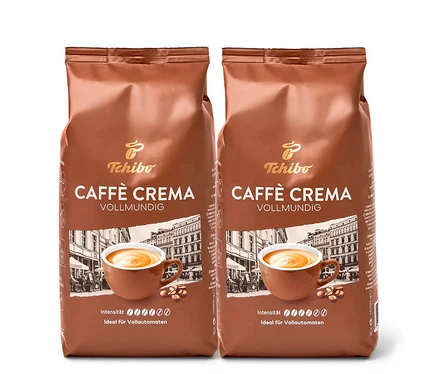 Deux paquets de Caffè Crema Vollmundig (intense) en grains – 2x 1 kg de Tchibo.