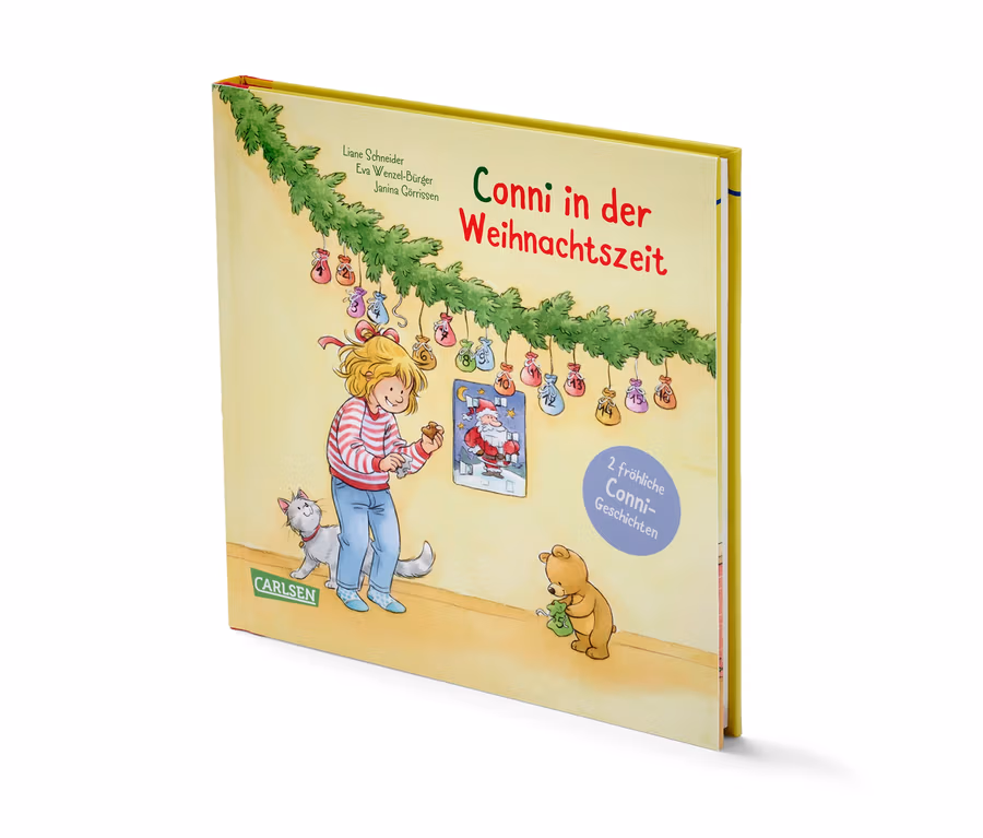 Un livre d'images pour enfants intitulé « Conni in der Weihnachtszeit » montre une fille, un chat et un ours en peluche dessinés dans un environnement de Noël.