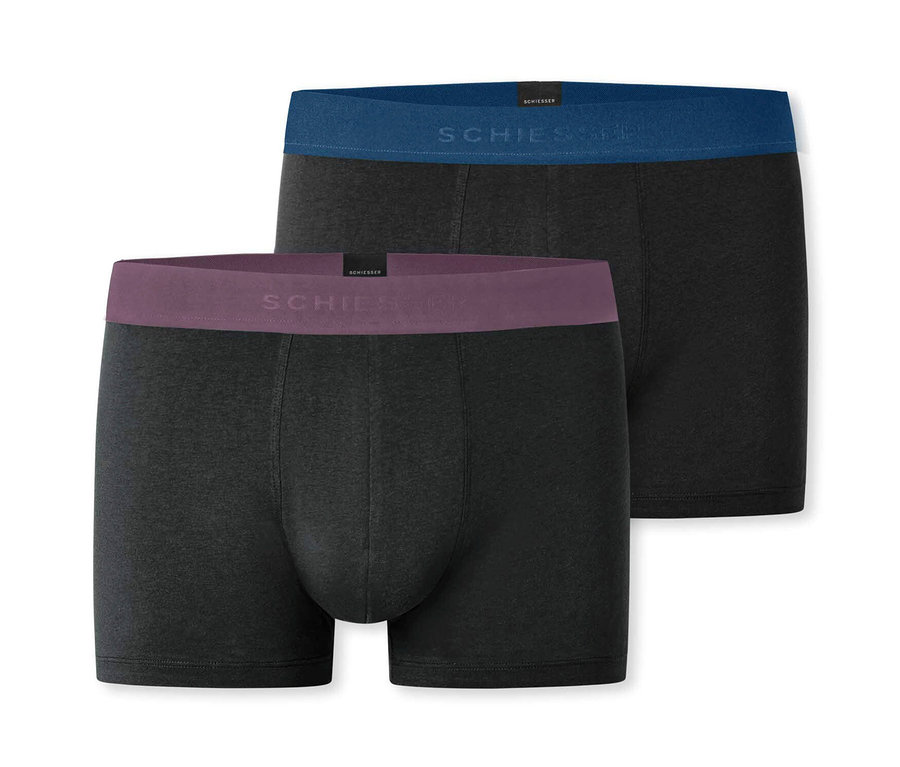 Deux boxers SCHIESSER longs noirs sont superposés.