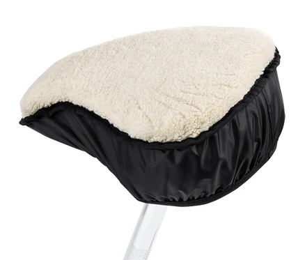 Gros plan d'une housse de selle 2-en-1 noire et crème.