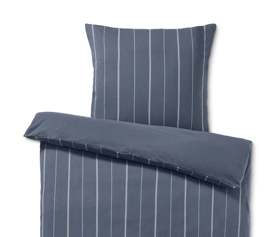 Parure de lit en jersey hivernal bleue avec des rayures blanches, taille normale.