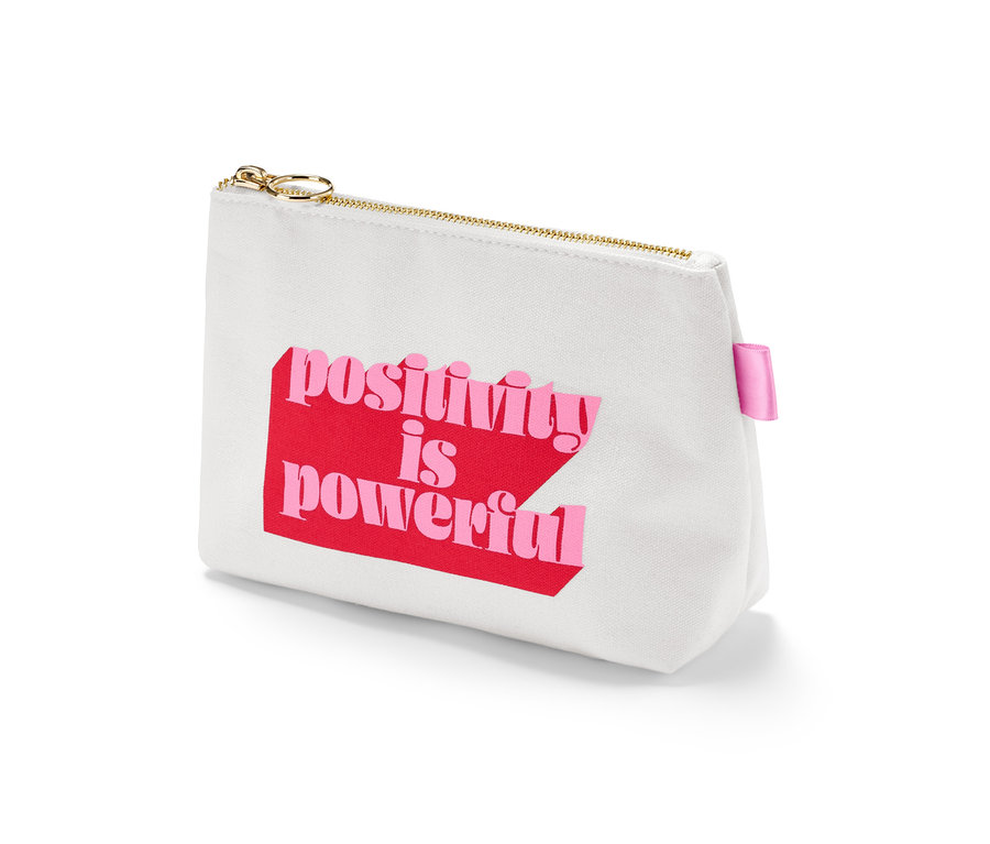 Trousse à cosmétiques blanche avec l'inscription "positivity is powerful".