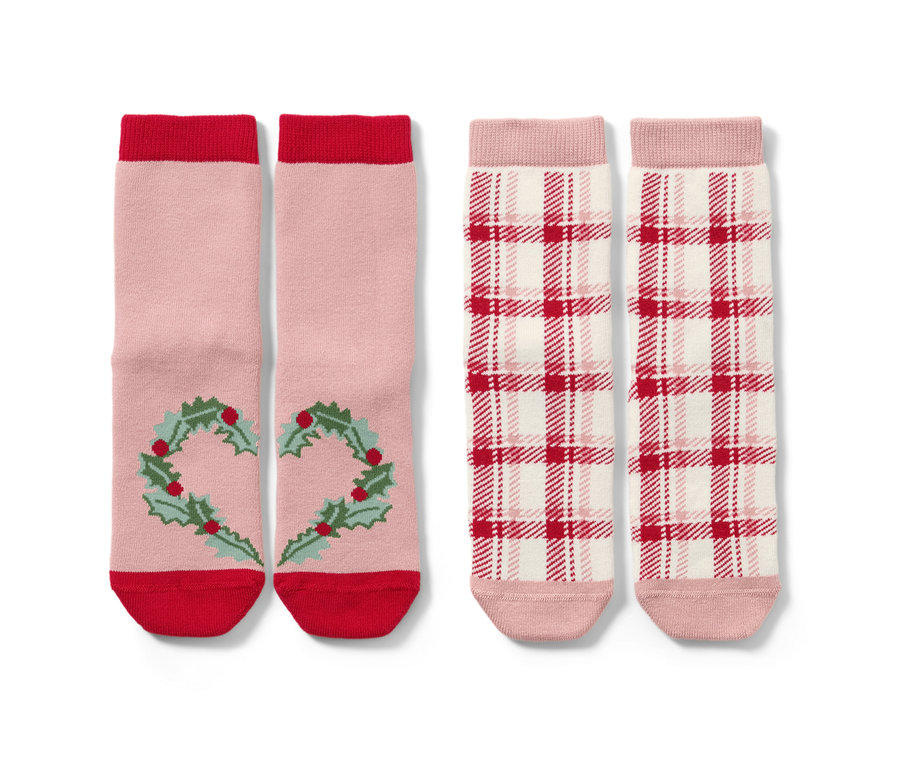 Deux paires de chaussettes antidérapantes pour tout-petits avec jacquard à cœurs.