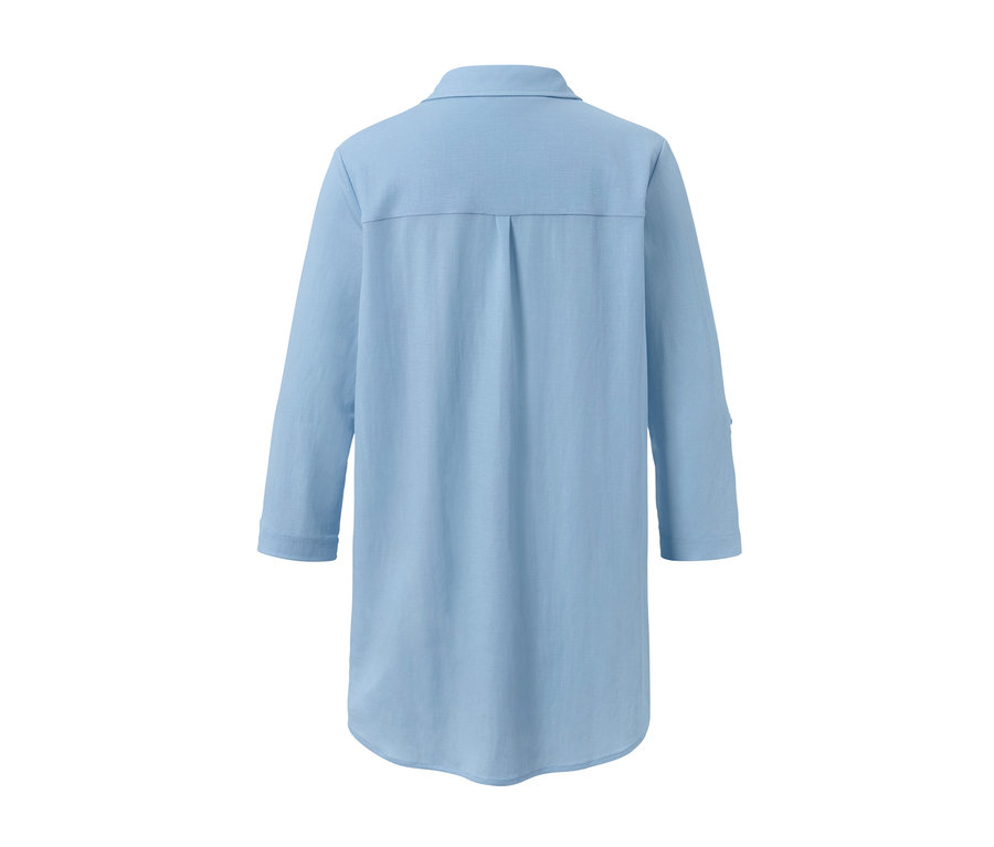 Chemisier en jersey piqué bleu clair vu de dos.
