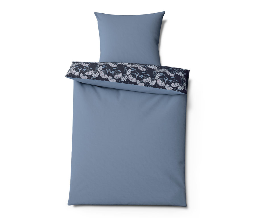 Une parure de lit en jersey hivernal bleu de taille standard avec un motif floral.