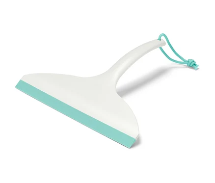 Raclette pour salle de bain blanche avec une lèvre en caoutchouc turquoise et un cordon turquoise pour l'accrocher.