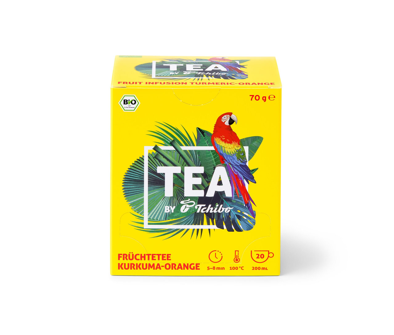 Paquet jaune de TEA by Tchibo infusion aux fruits bio curcuma-orange avec une illustration de perroquet et de feuilles tropicales.