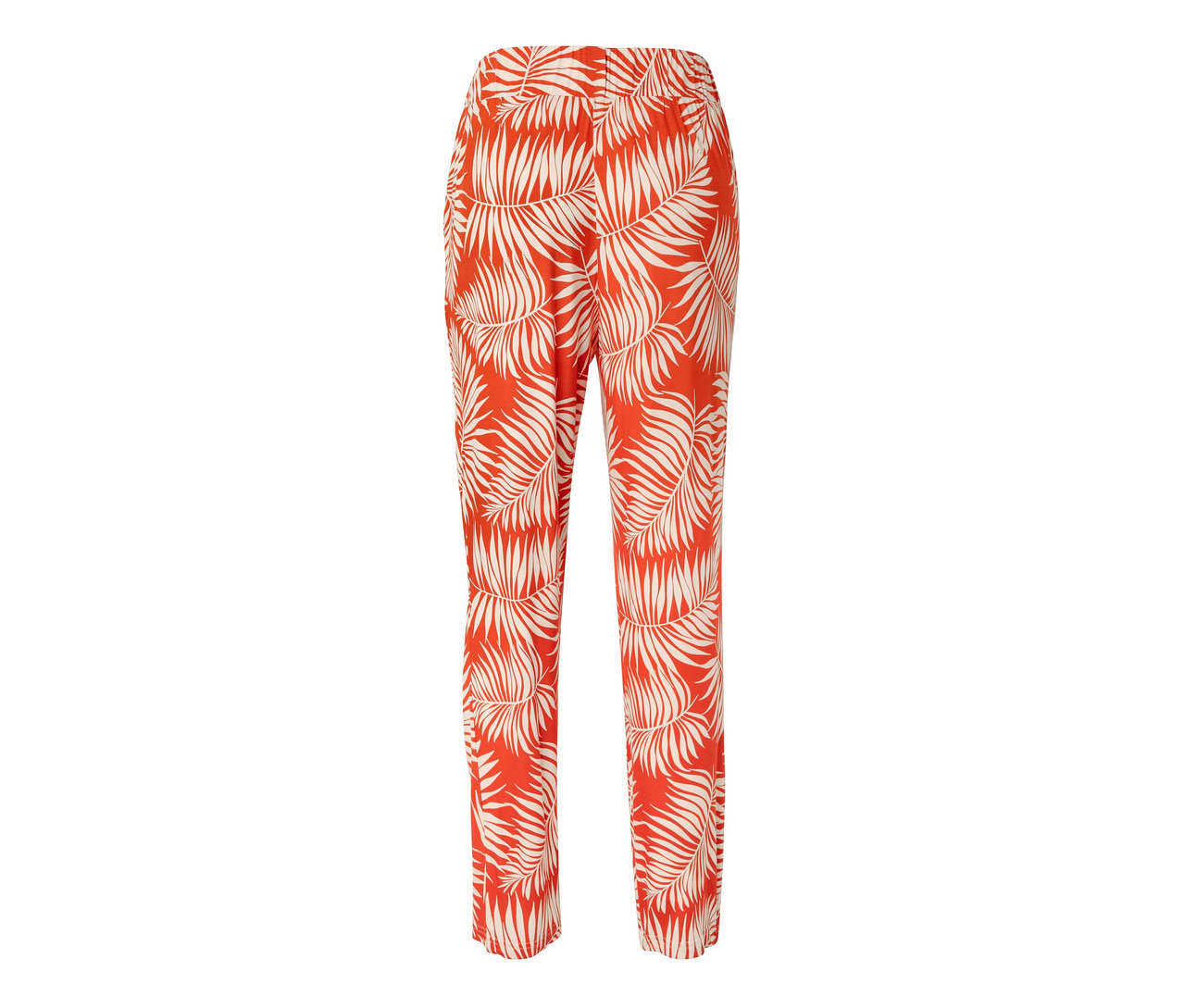 Pantalon en jersey orange avec imprimé de feuilles.