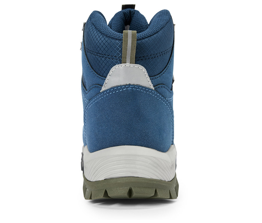 Gros plan de l'arrière d'une chaussure de randonnée bleue avec une semelle grise.