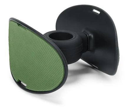 Détail d'un support noir avec un coussinet vert.