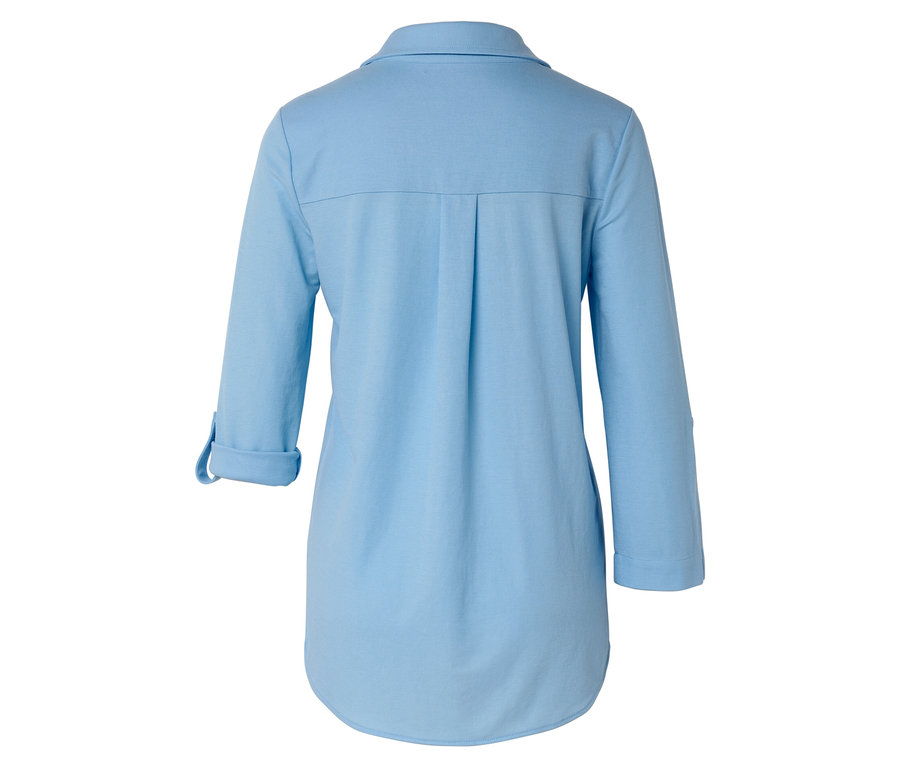 Vue arrière d'une chemise bleu clair à manches longues.