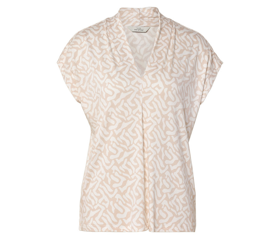 Un chemisier à manches courtes beige et blanc à motif avec un col en V.