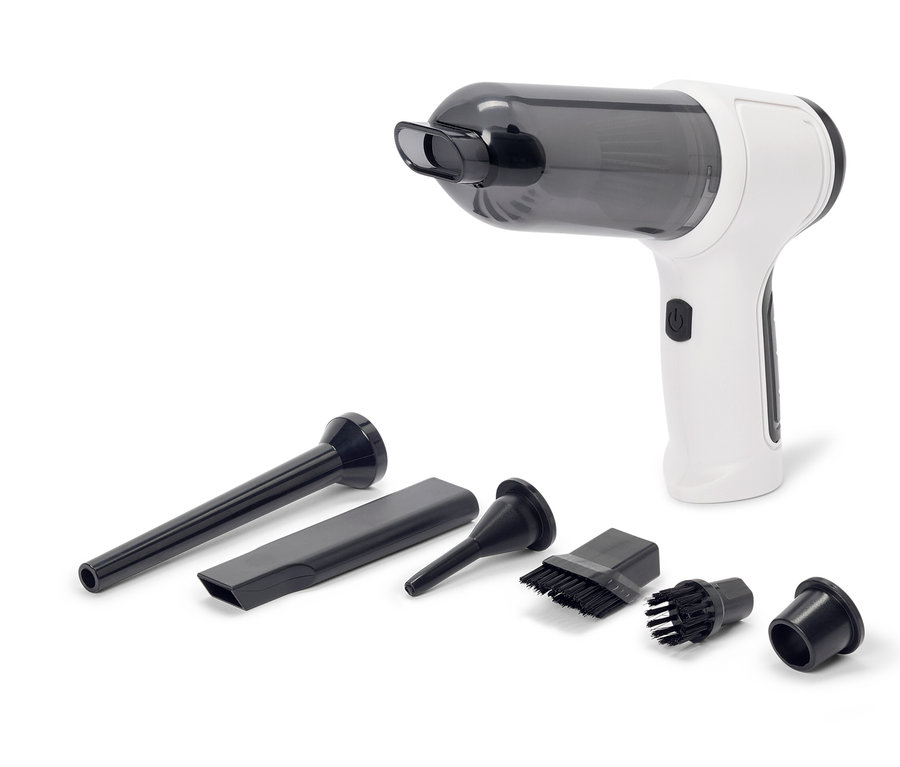 Un aspirateur à main blanc et gris avec divers accessoires noirs sur fond blanc.