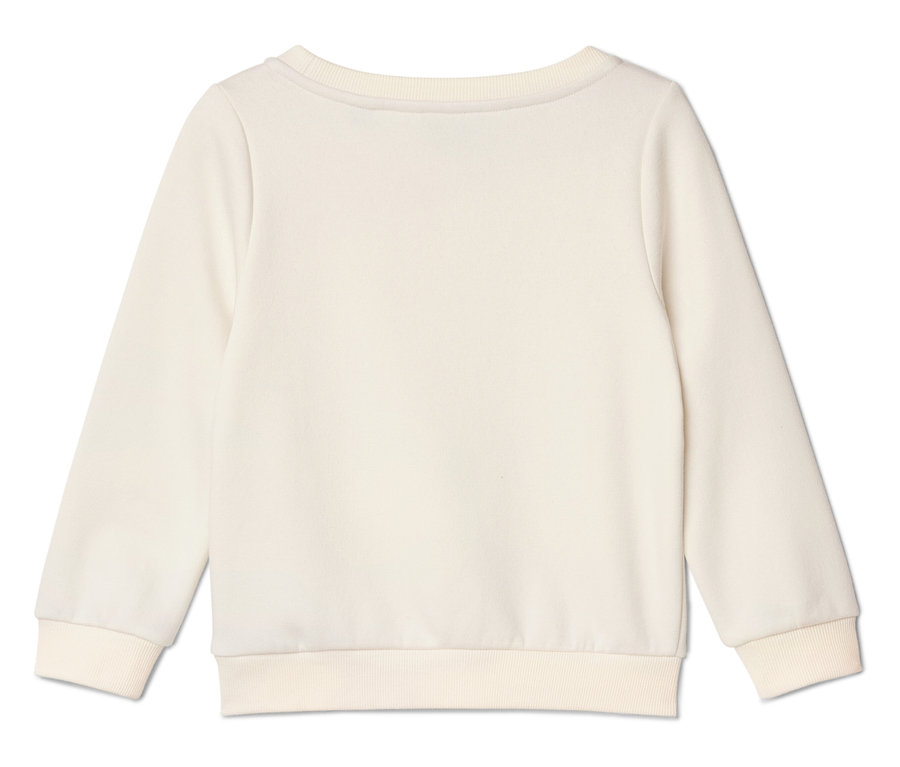 Un pull crème à manches longues, vu de dos.
