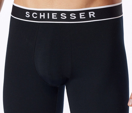 Caleçon boxer noir avec ceinture noire, bande blanche et logo SCHIESSER blanc.