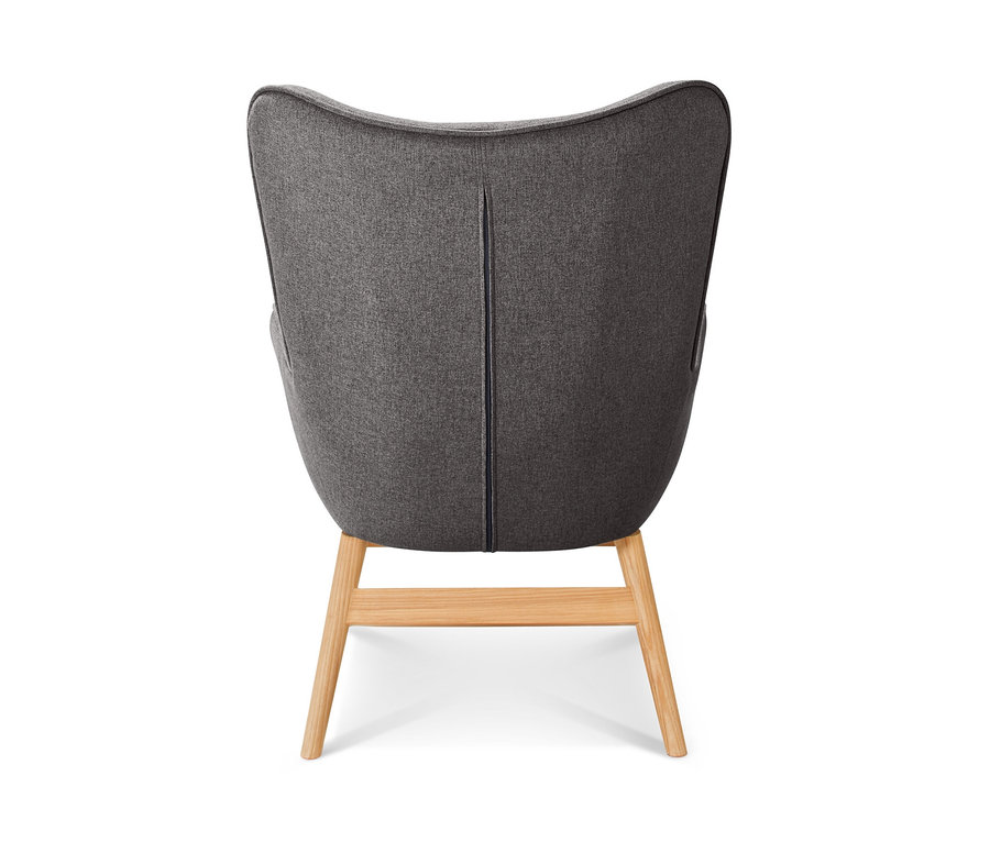 Vue arrière d'un fauteuil inclinable gris foncé avec repose-pieds.