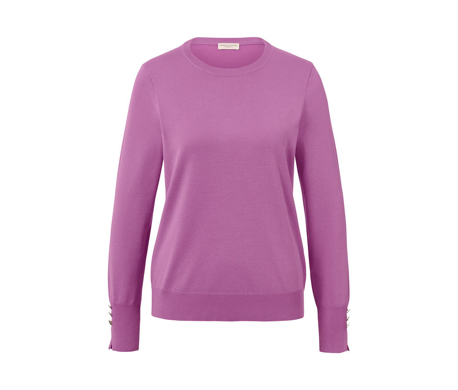 Pull en maille fine rose.