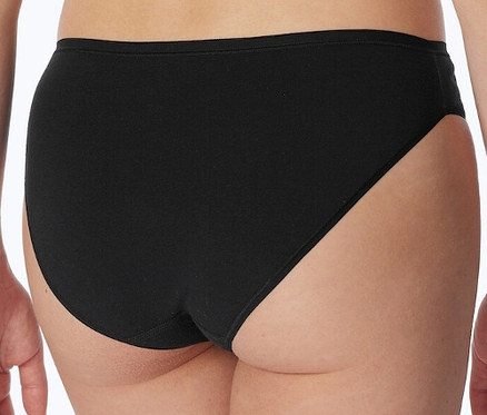 Vue arrière d'une femme portant 2 mini-slips SCHIESSER en coton bio, noir.
