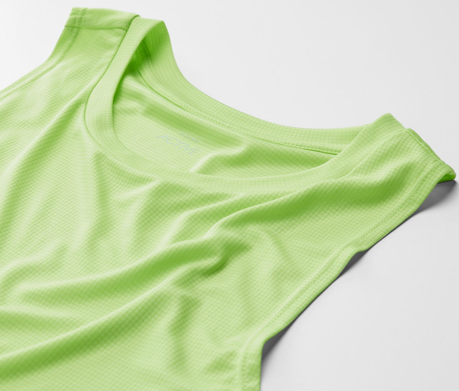 Gros plan d'un débardeur de sport vert citron.