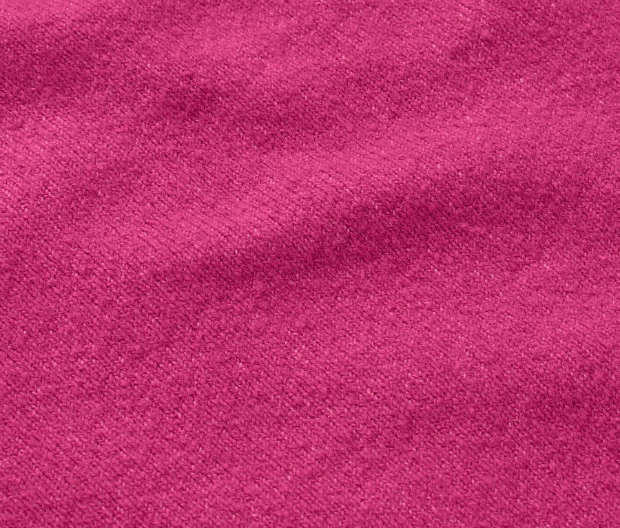 Gros plan sur une texture de tissu de couleur fuchsia.