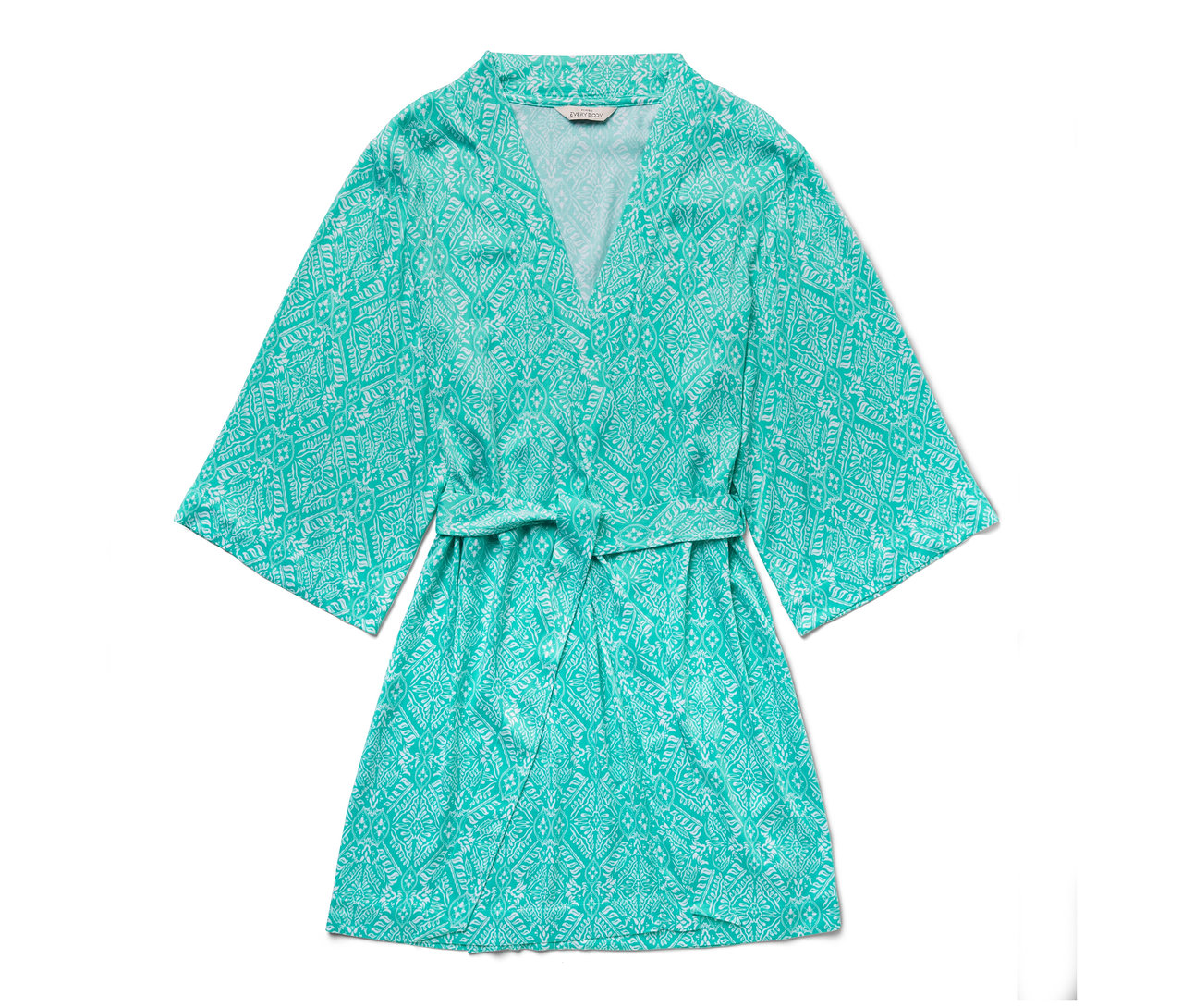 Robe de chambre turquoise à motifs blancs.