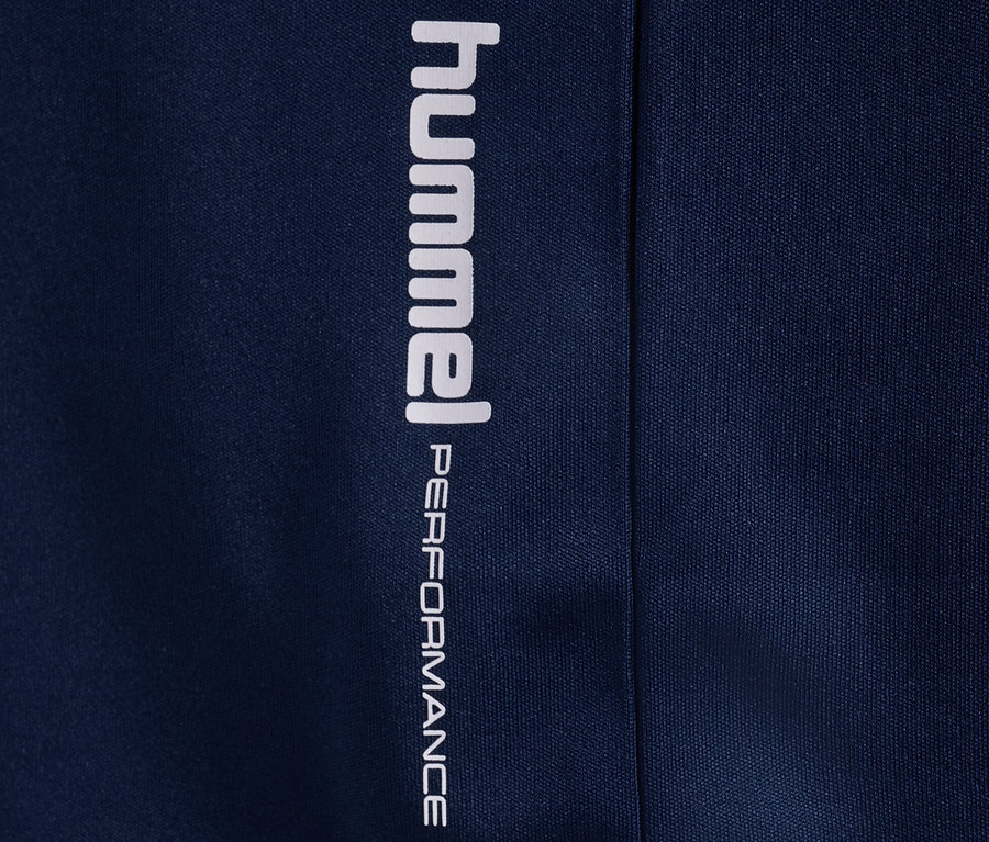 T-shirt d’entraînement HUMMEL HMLJR pulse bleu foncé avec un logo blanc.