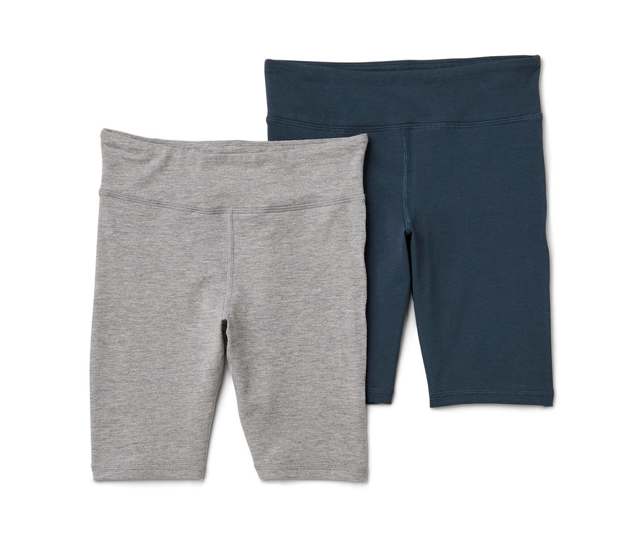 Deux leggings cyclistes pour enfant : un gris et un bleu marine.